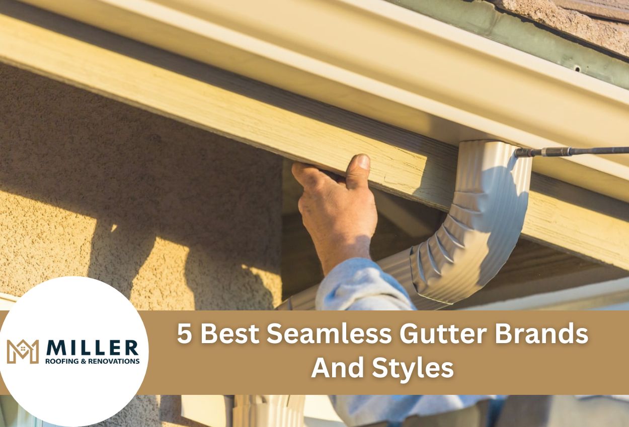 Worker installing seamless gutter system on residential home exterior